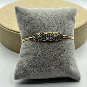 10k womens blue topaz Elegant Blue and Gold Bracelet with Intricate Design